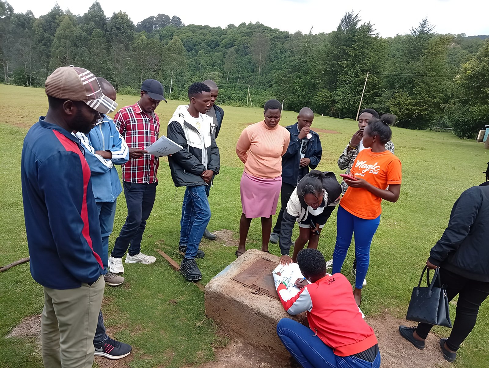 Participants working on a group exercise outdoors